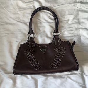 Brown handbag with Prada logo